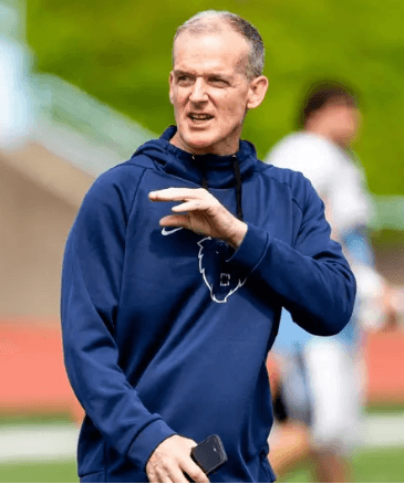 Coach Bob Gilmartin with Columbia athletes
